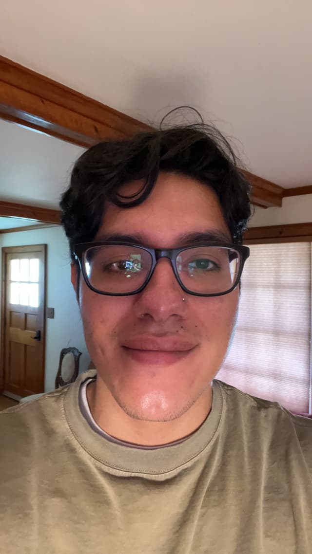 Argel Hernandez Amaya wearing sombraro, smiling